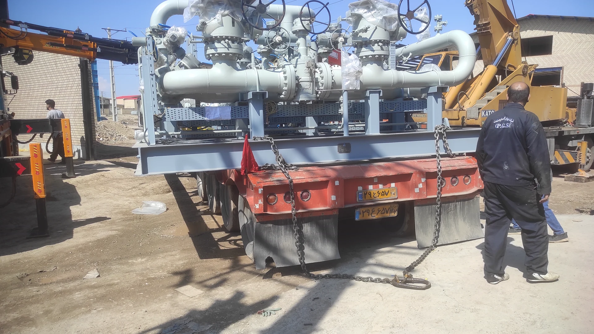 Loading the metering skid for transport to the Shazand refinery